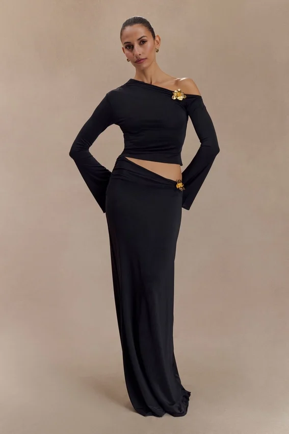 Ainsley Asymmetrical Maxi Skirt With Floral Hardware – Black Ainsley Asymmetrical Maxi Skirt With Floral Hardware – Black