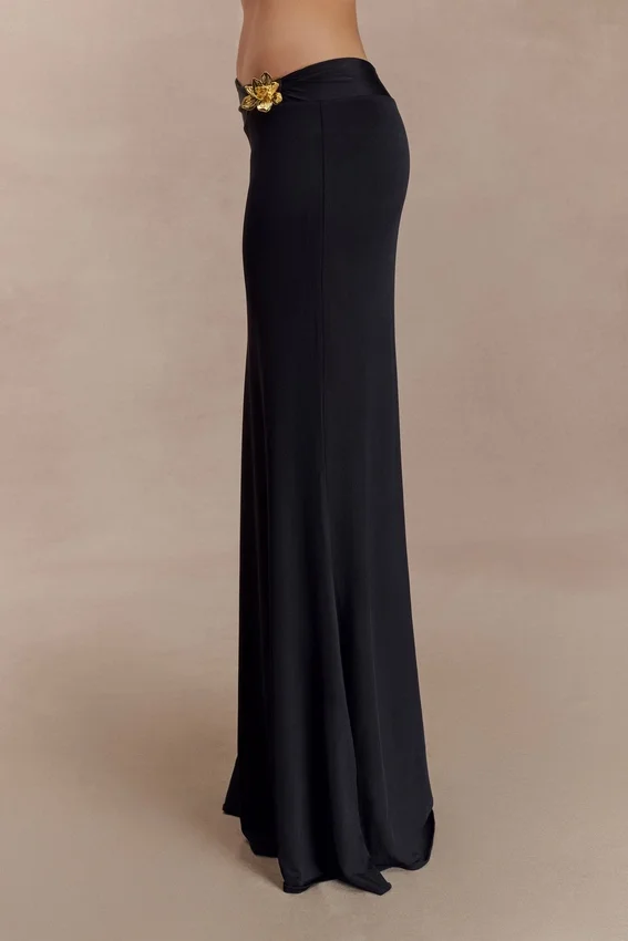 Ainsley Asymmetrical Maxi Skirt With Floral Hardware – Black Ainsley Asymmetrical Maxi Skirt With Floral Hardware – Black