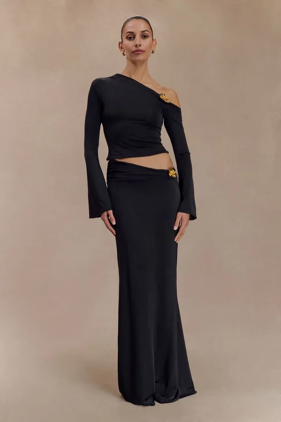 Ainsley Asymmetrical Maxi Skirt With Floral Hardware – Black Ainsley Asymmetrical Maxi Skirt With Floral Hardware – Black