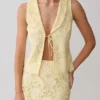 Tessa Broderie Tie Front Sleeveless Top – Lemon Tessa Broderie Tie Front Sleeveless Top – Lemon